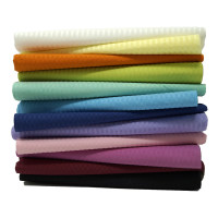 Stomatoloģiskās pacientu salvetes oranžas 45 cm x 33 cm N50 Unigloves